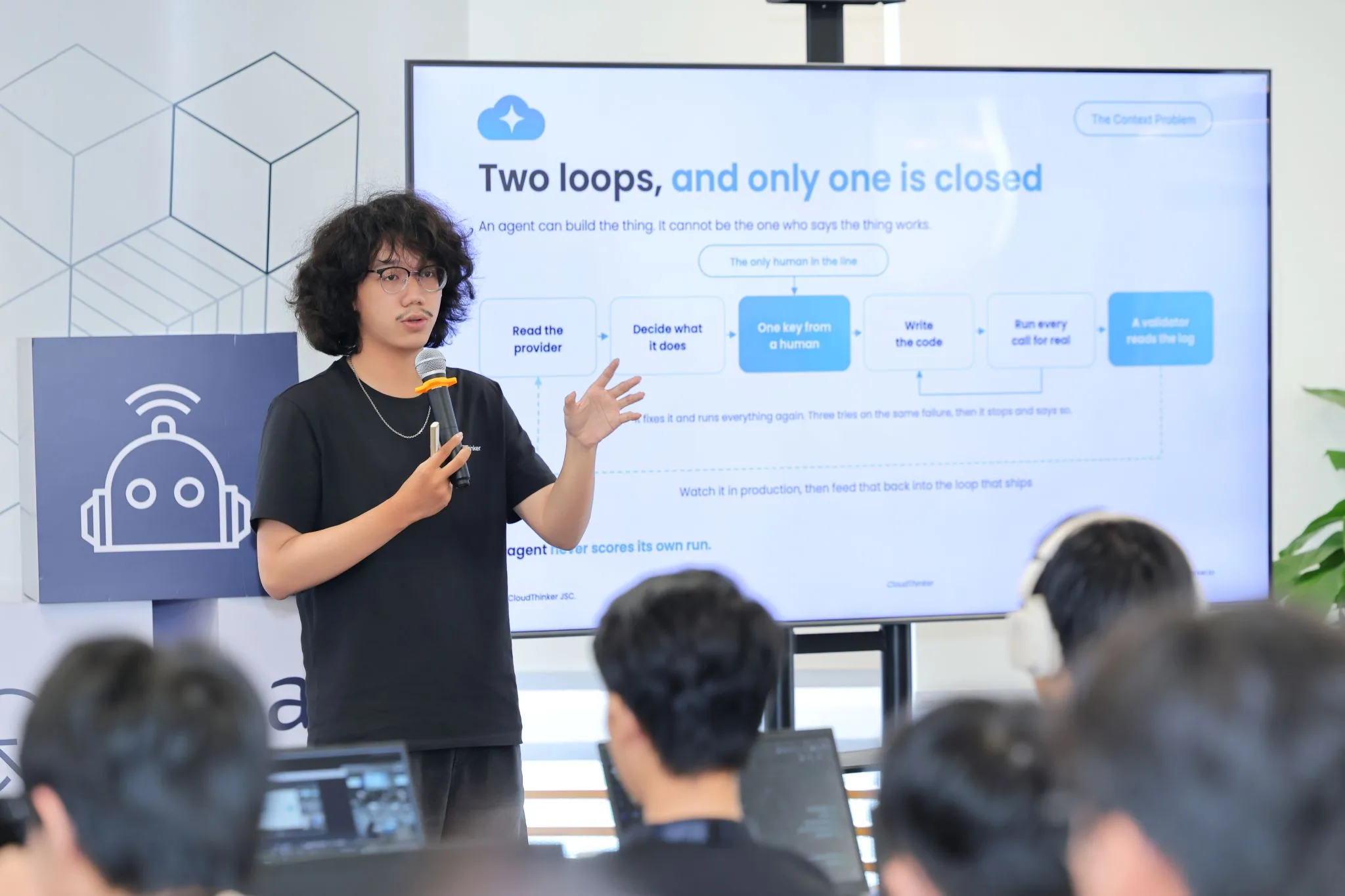 A CloudThinker engineer presenting how agents and people share the loop